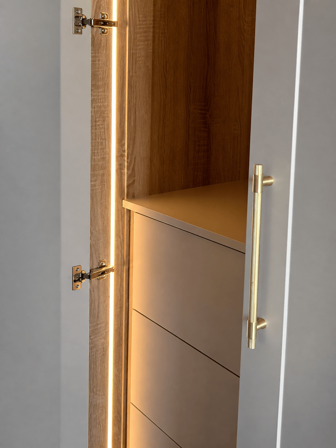 Close-up detail of bespoke fitted wardrobe showing quality painted finish, precise joinery and premium hardware, by JAX Bespoke