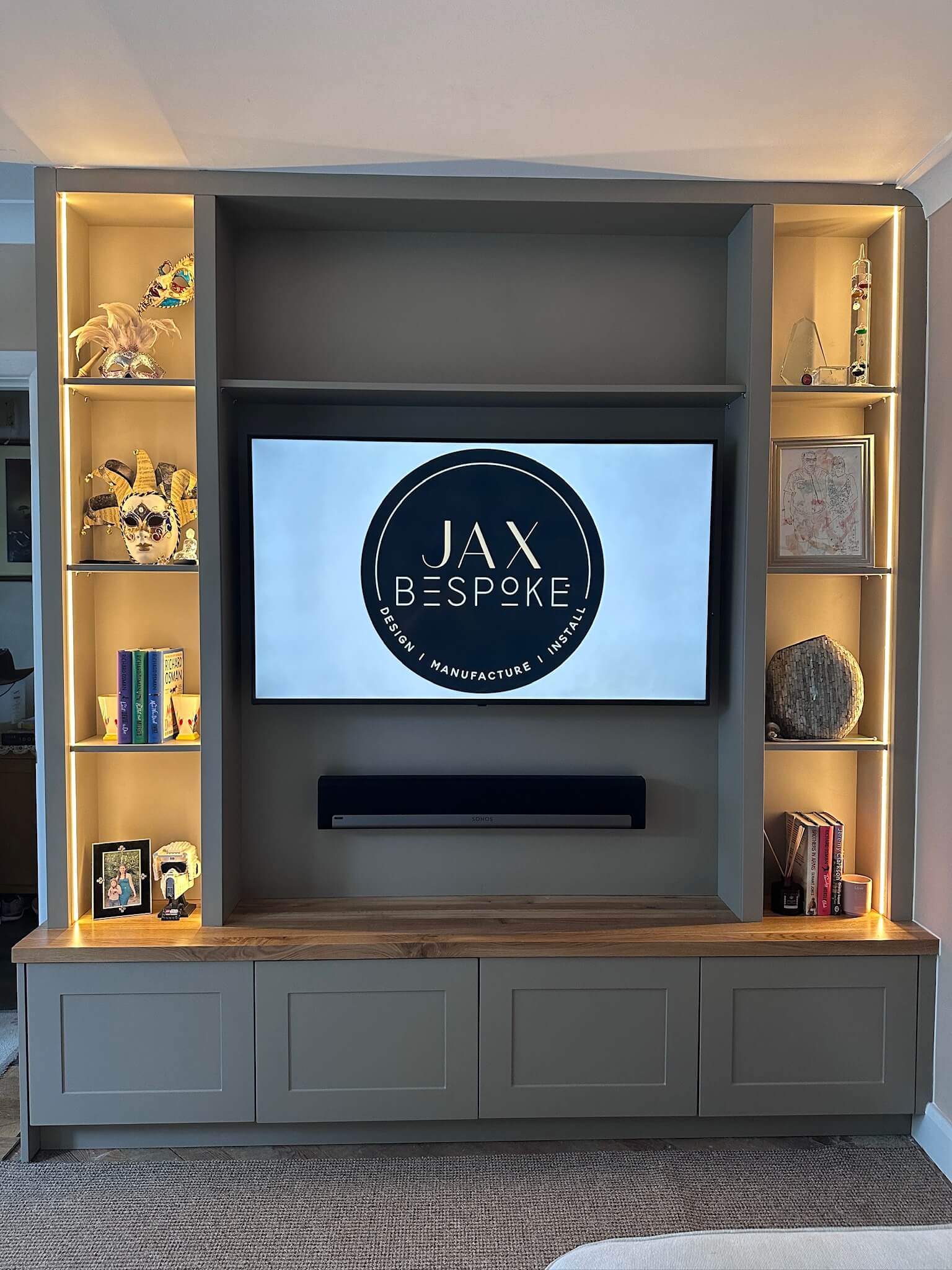 Fitted cabinetry media unit with integrated storage by JAX Bespoke Yorkshire
