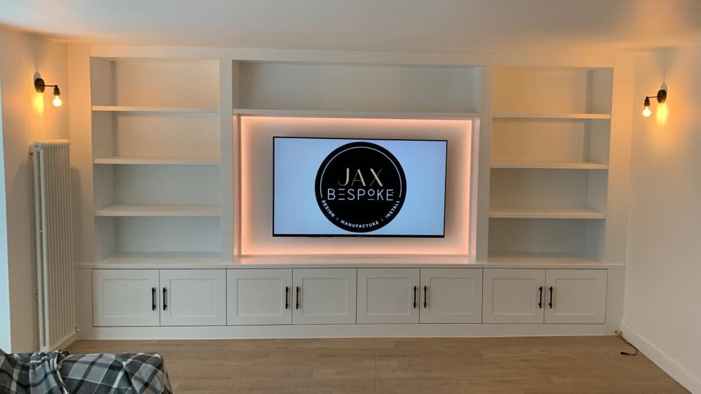 Classic bespoke cabinetry media wall with integrated TV unit and handcrafted storage, designed and built by JAX Bespoke
