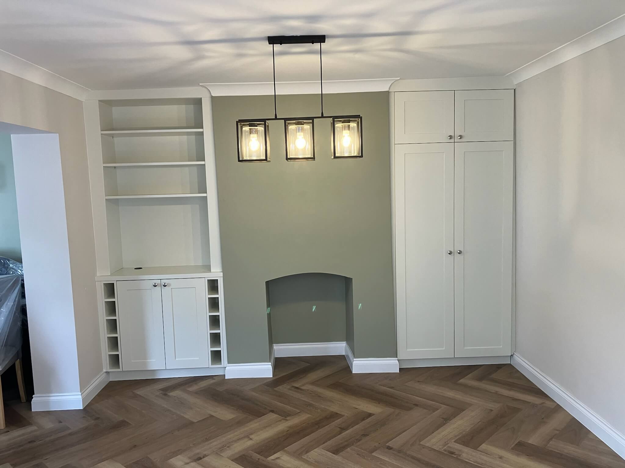 Bespoke alcove cabinetry fitted either side of chimney breast, designed and installed by JAX Bespoke Yorkshire
