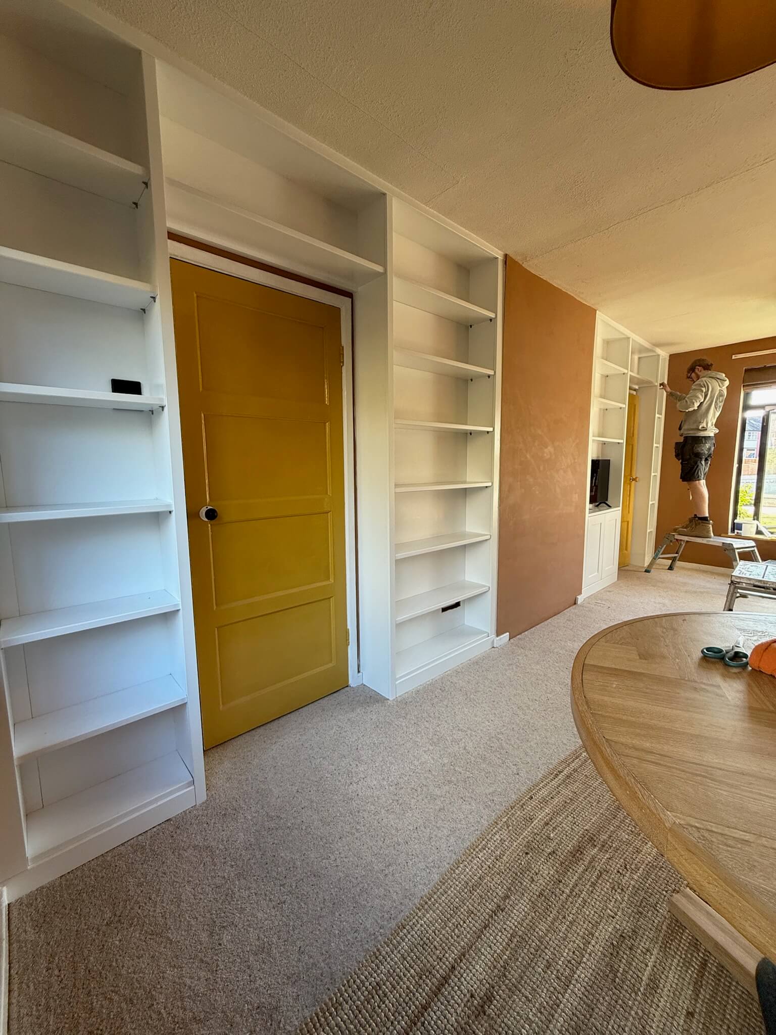 Full wall bespoke fitted alcove cabinetry after installation by JAX Bespoke Yorkshire