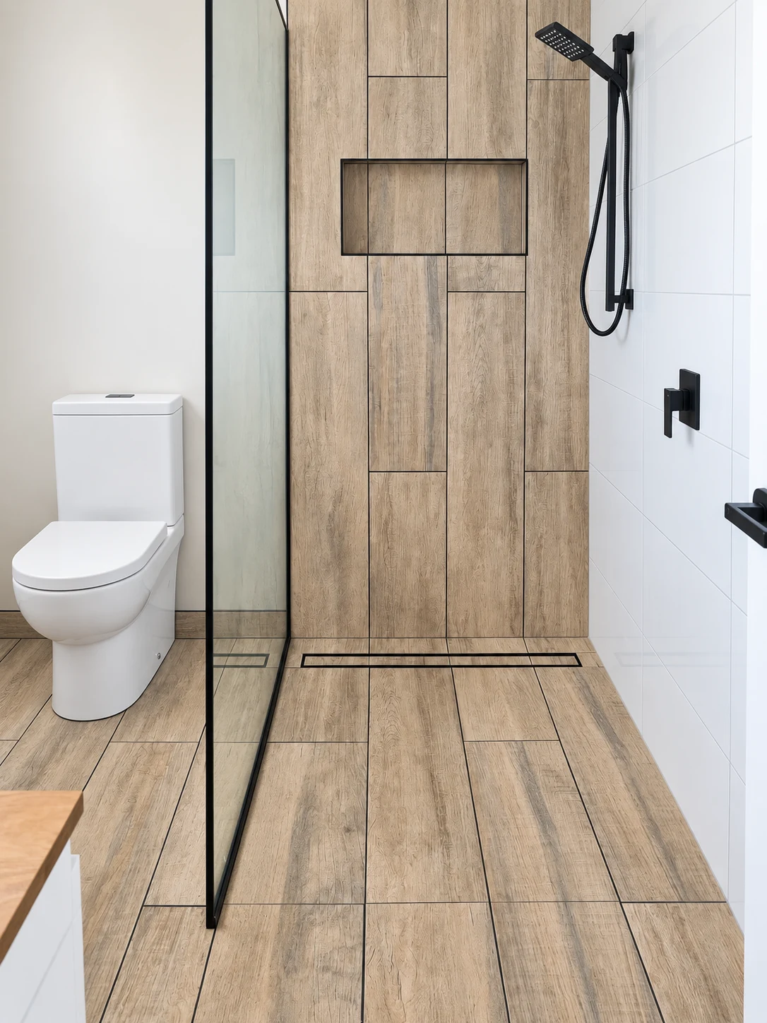 Timber-look tiled shower with matte black fixtures
