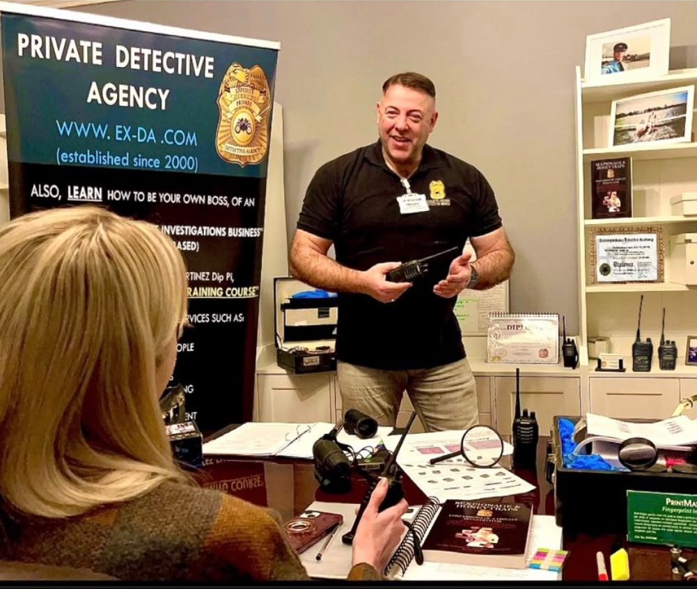 Richard Martinez training a student at the Expedite Detective Agency office