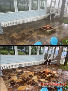 Before and after of a stone patio: dirty darkened stone above, clean stone below