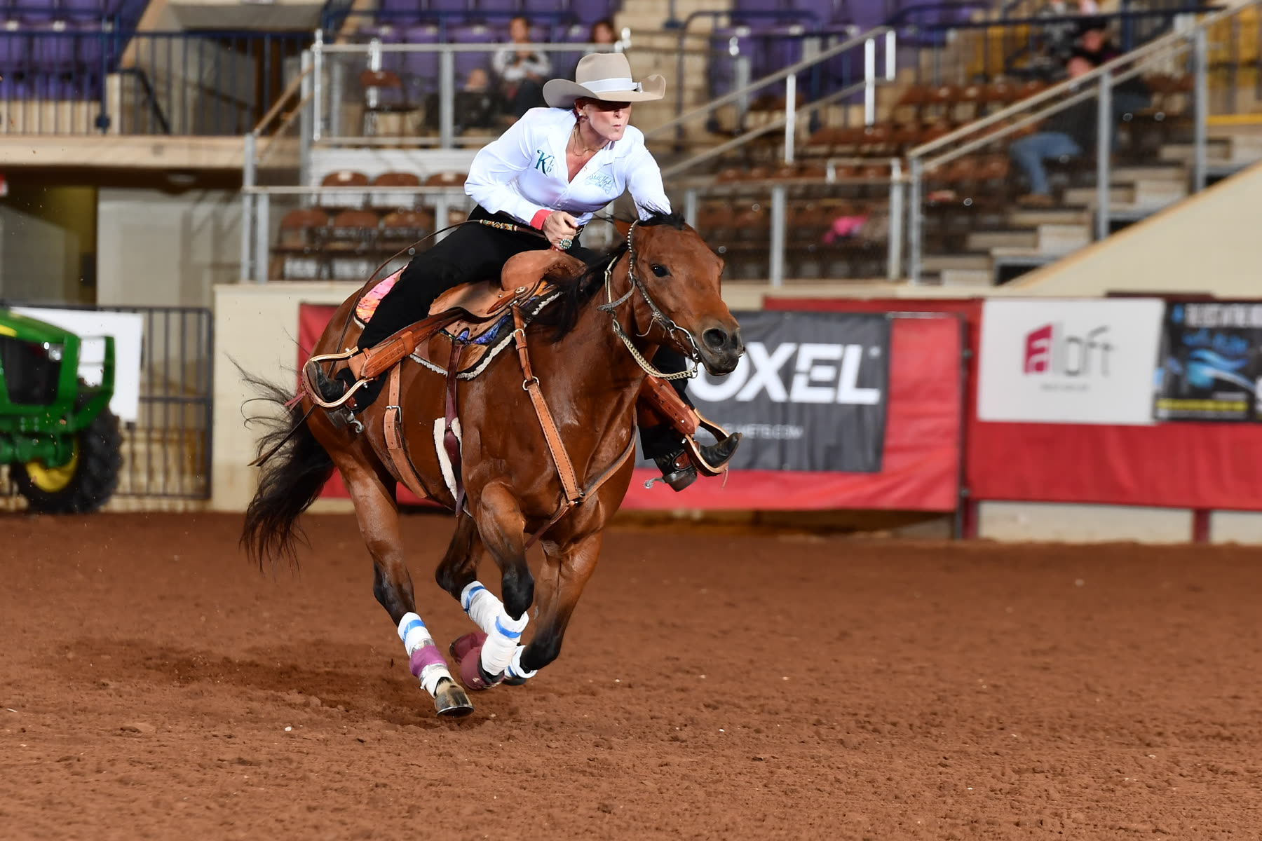 Kendra Dickson (KD) running barrels in competition