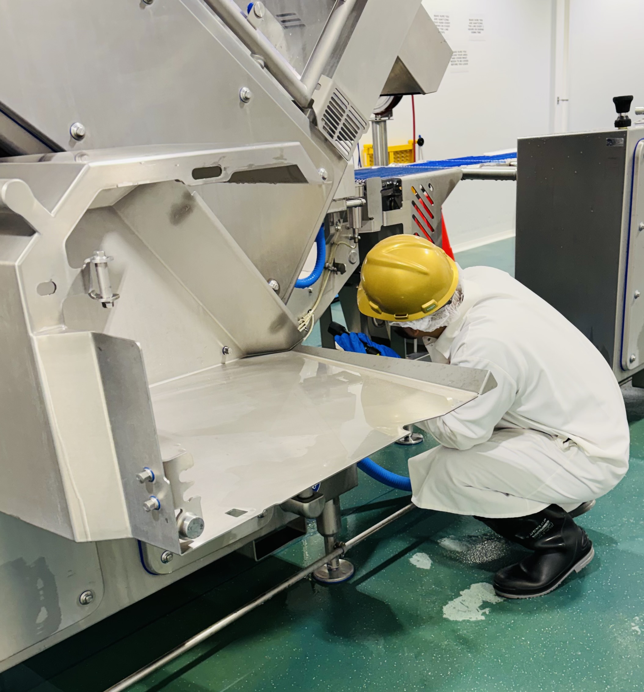 Elite Professional Contract Services sanitation crew at a food processing facility