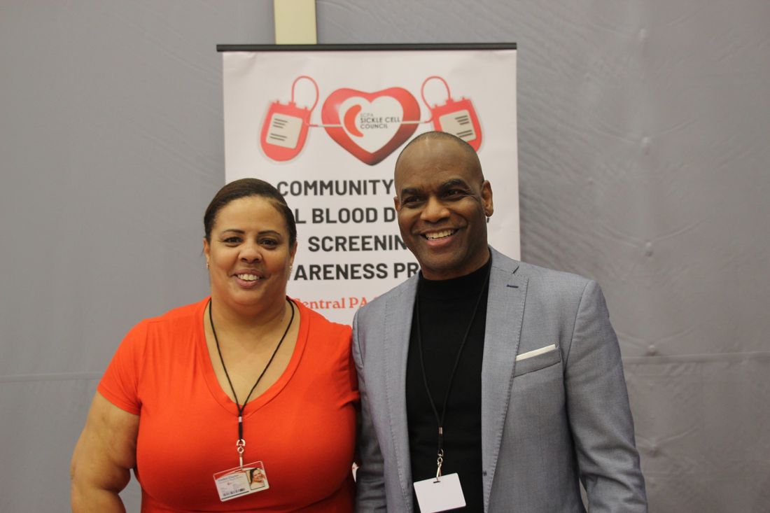 Dwayne Golden with a guest at a community blood drive and sickle cell awareness event