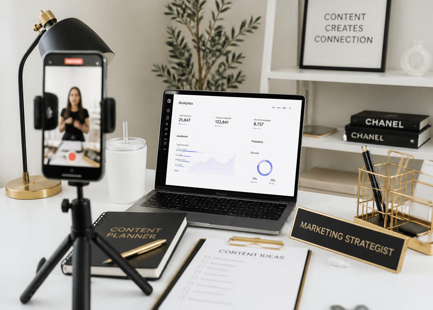 A marketing strategist workspace with content planner, analytics dashboard and filming setup
