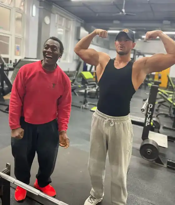 Two Dowe Dynamics members flexing after a body transformation