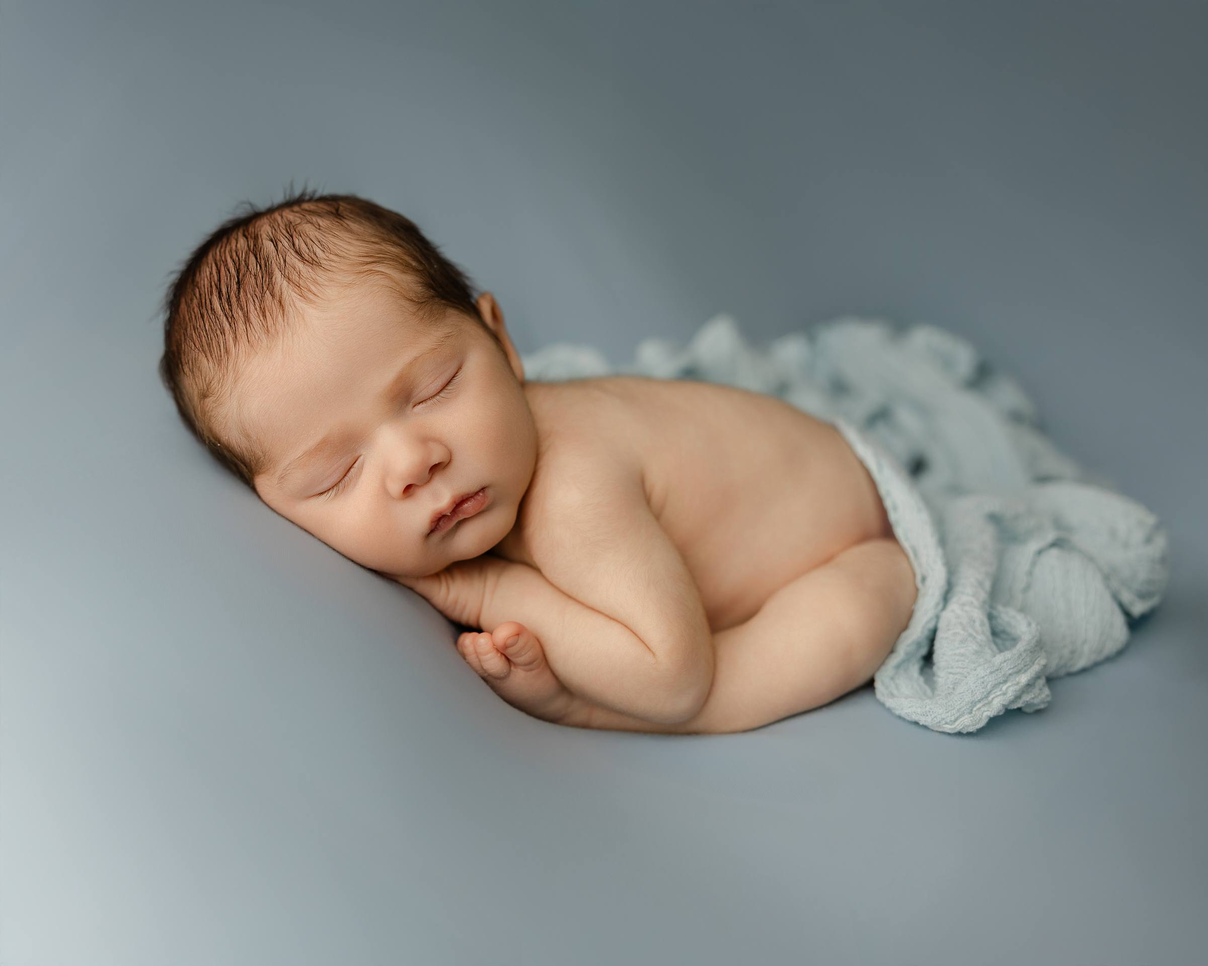 Beautiful sleeping newborn baby captured by Kaitlyn Dawn Photography
