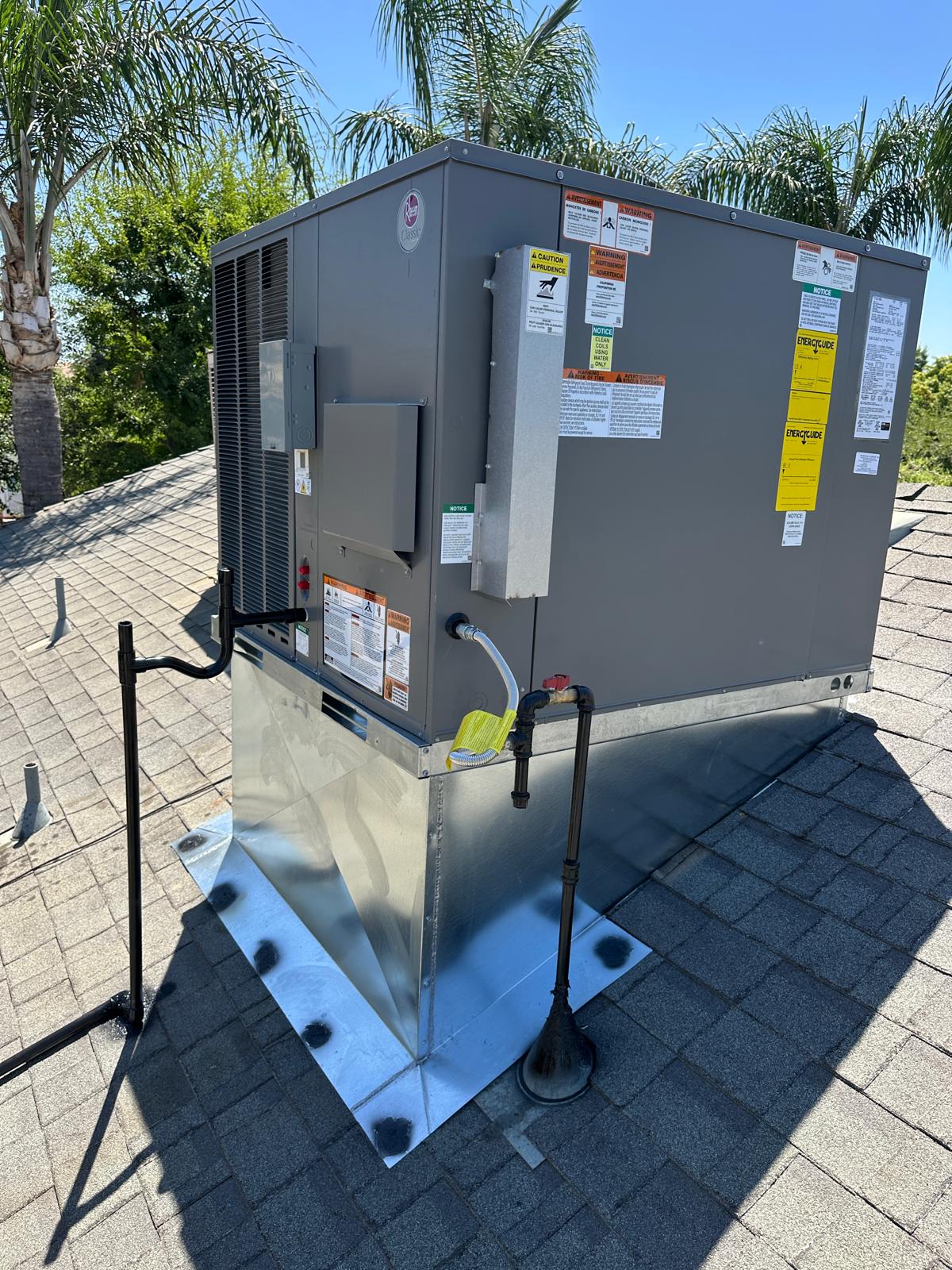 Rooftop HVAC package unit installed on a residential property