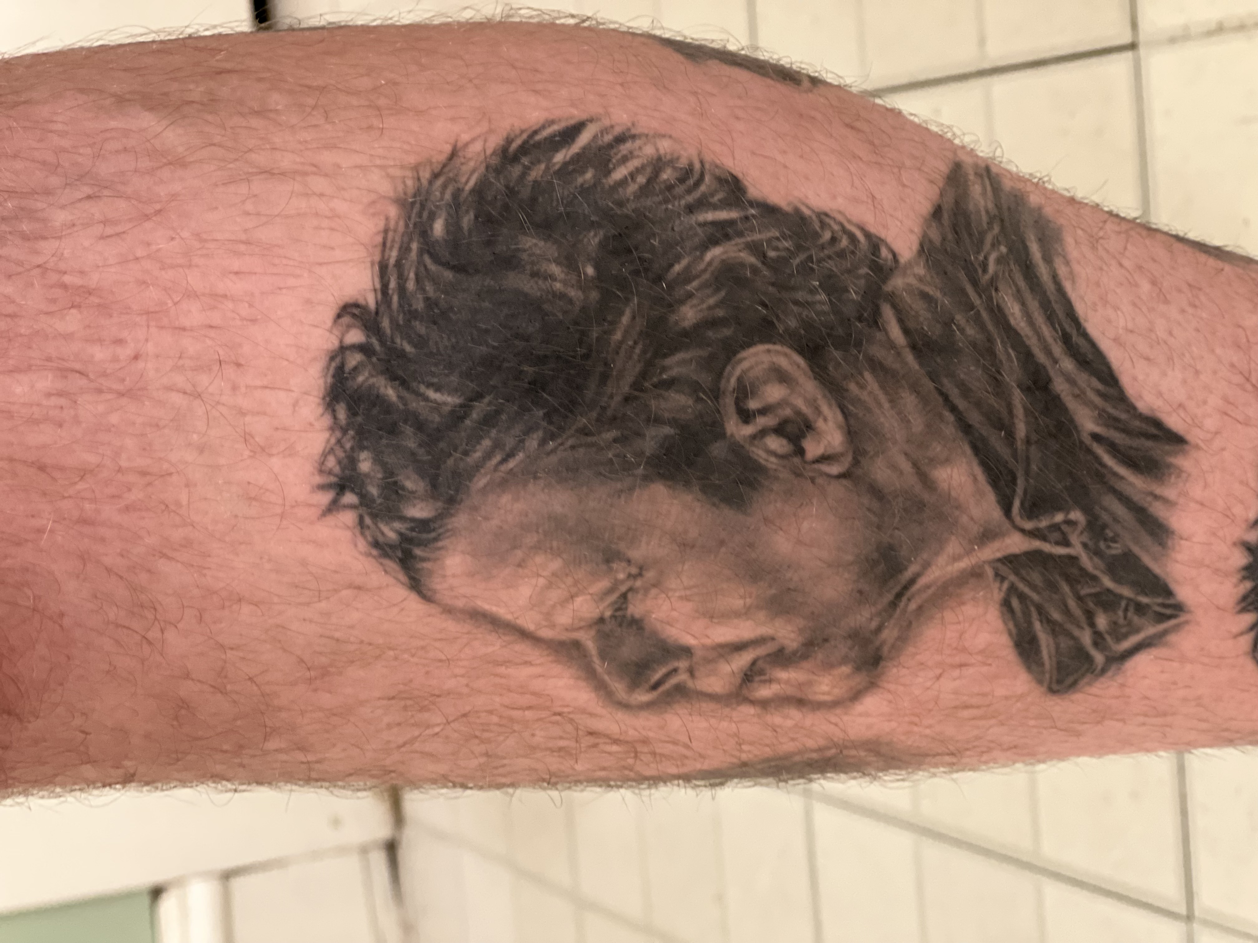 Tom Waits · Healed portrait tattoo by Eric Bess