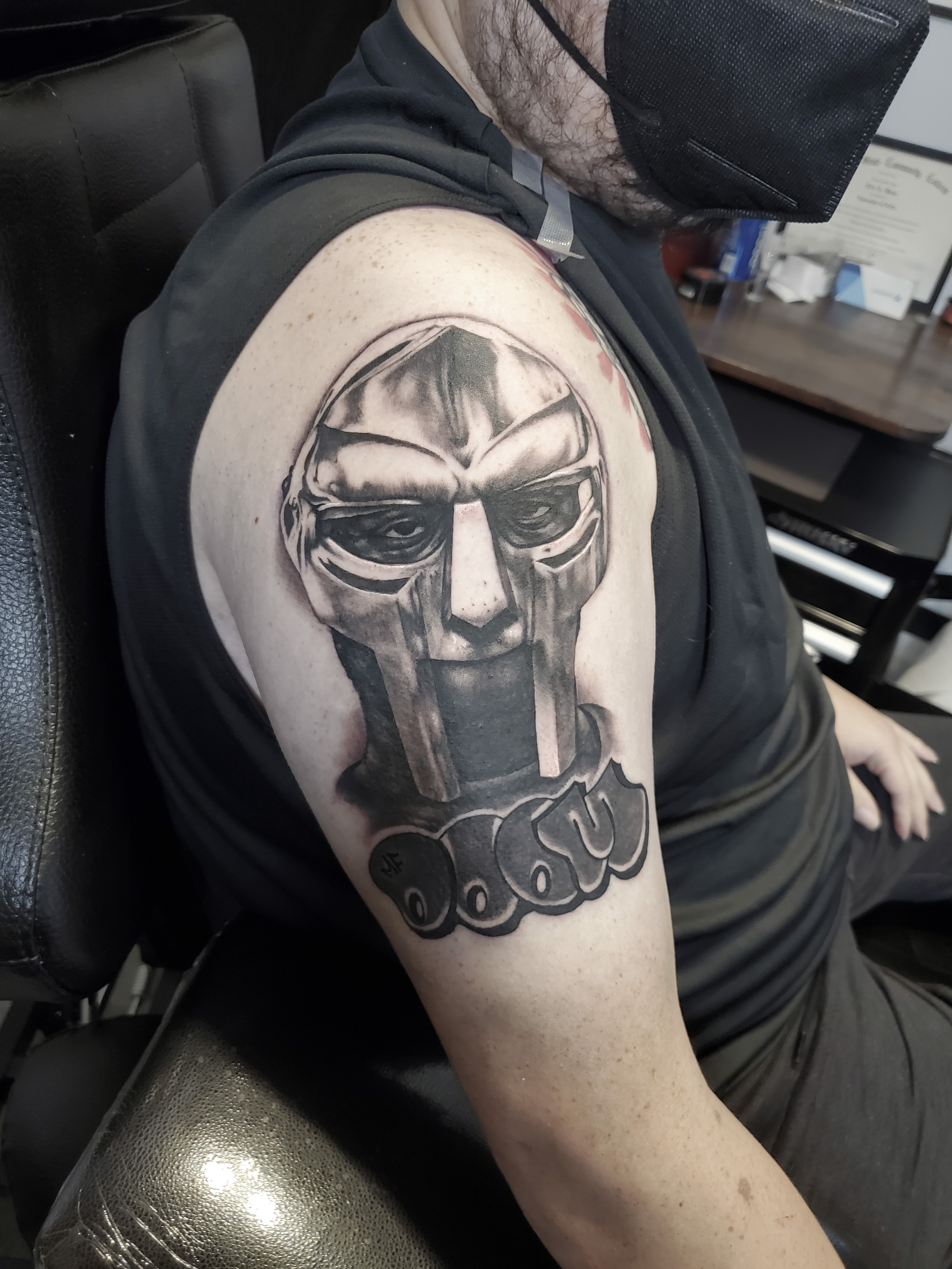 MF DOOM tattoo by Eric Bess