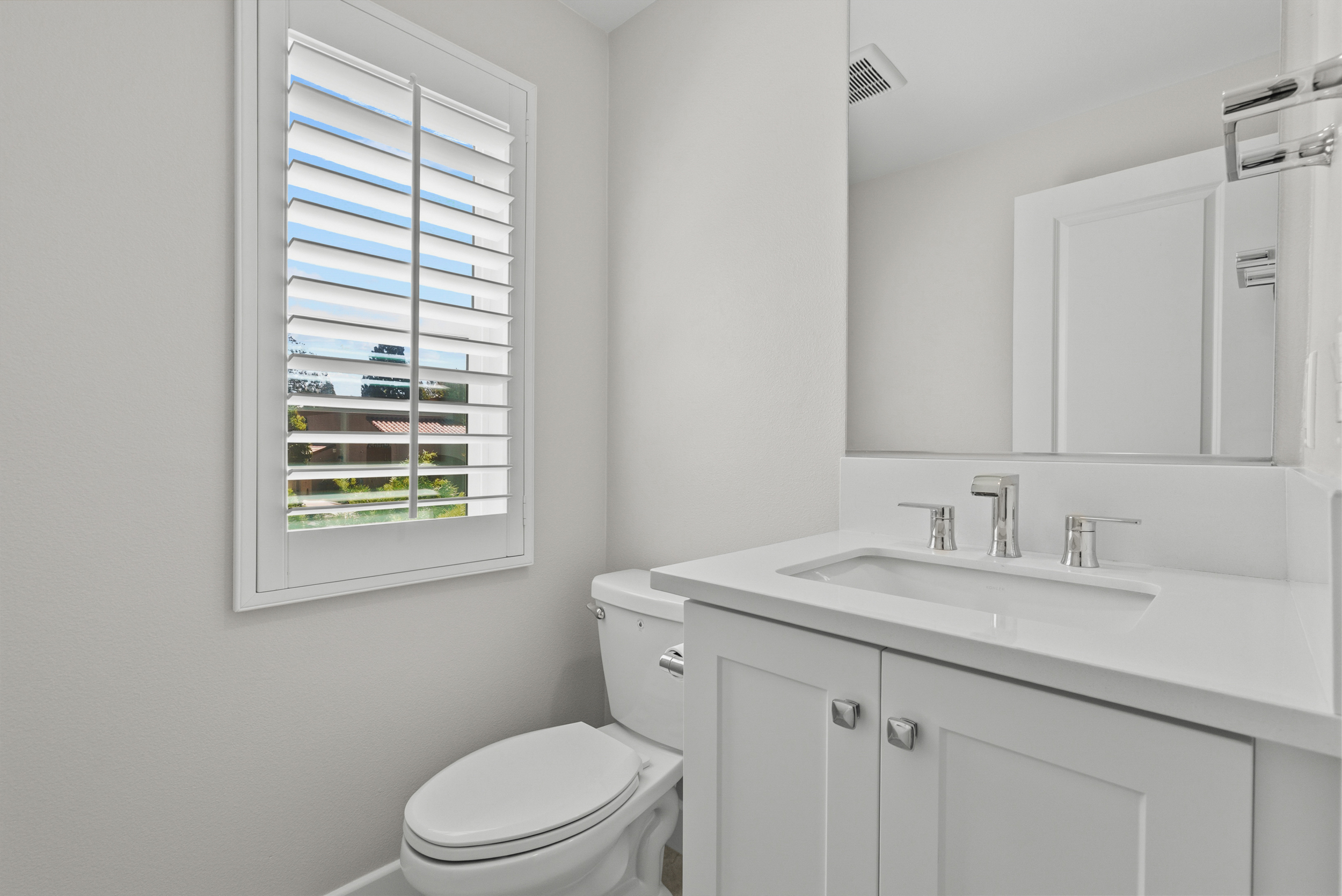 Powder room with shutters