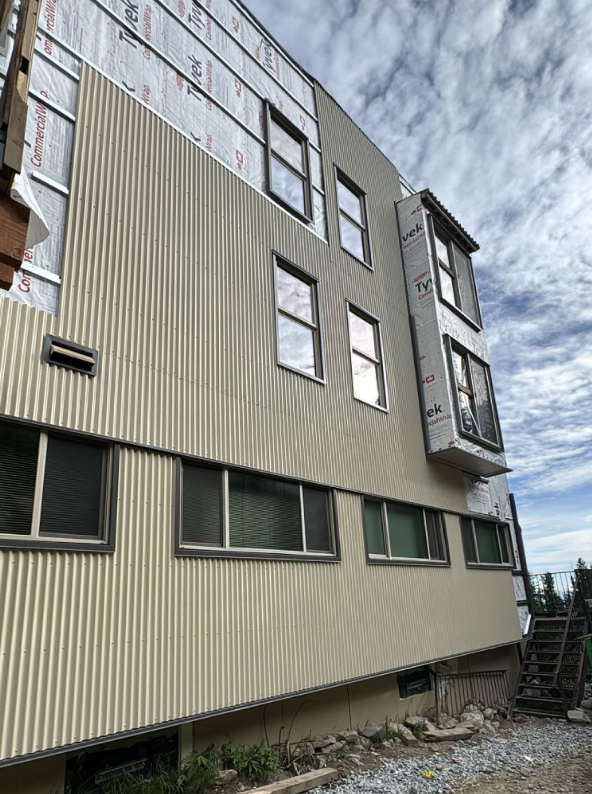 Moguls Hotel & Condos at Big White Ski Resort after siding installation