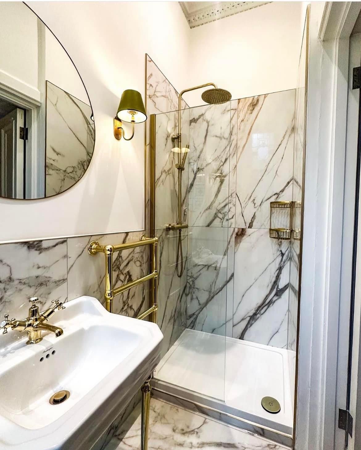 A completed Knockout Bathrooms installation, tiled floor to ceiling