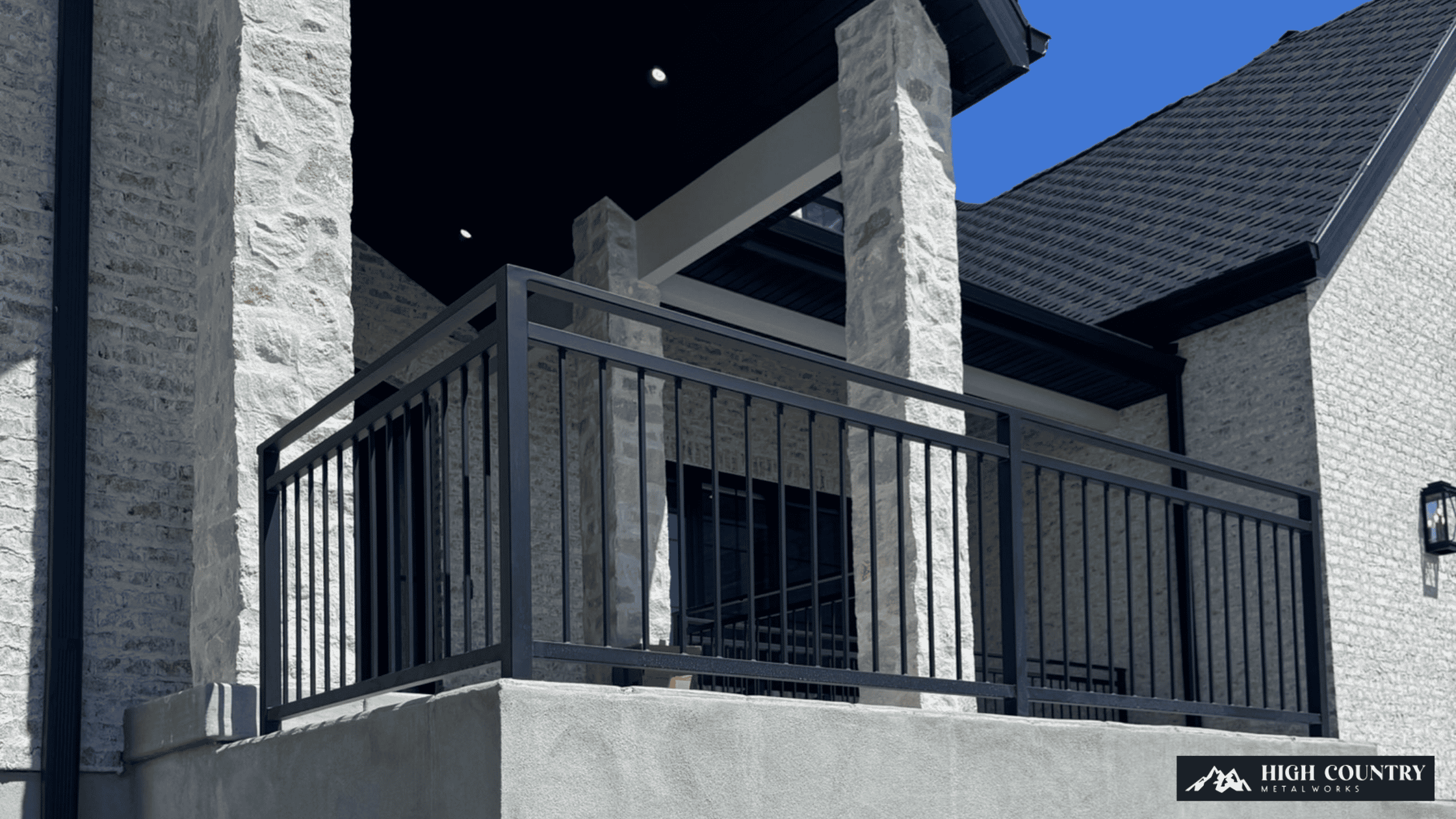 St. George's black metal railings on a balcony, emphasizing both style and functionality in residential design. St. George's black metal railings on a balcony, emphasizing both style and functionality in residential design.
