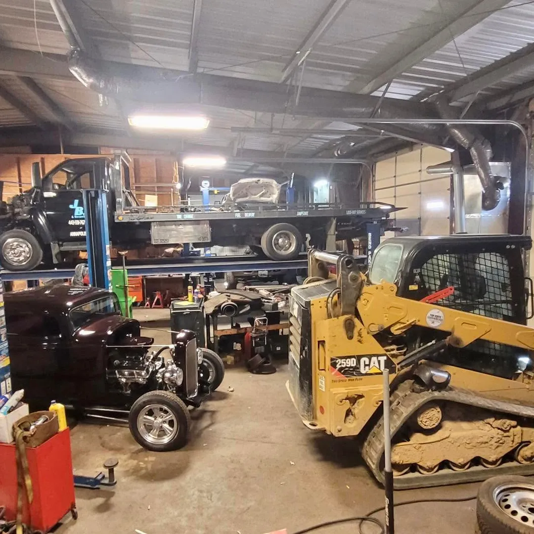 Ireland Diesel Auto shop with work vehicles and equipment
