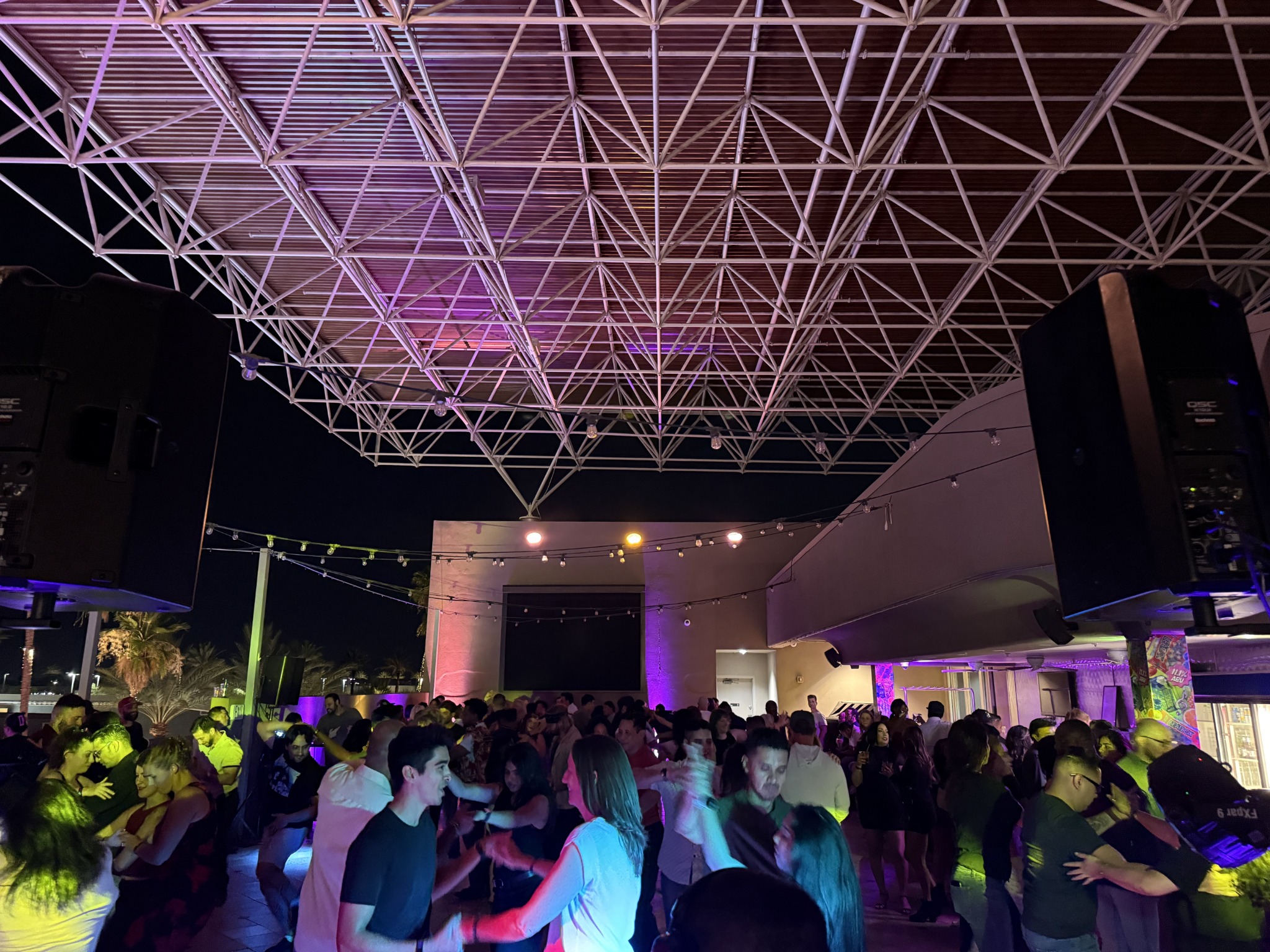 A lively Bachata Addiction Rooftop Social at Dave and Buster’s