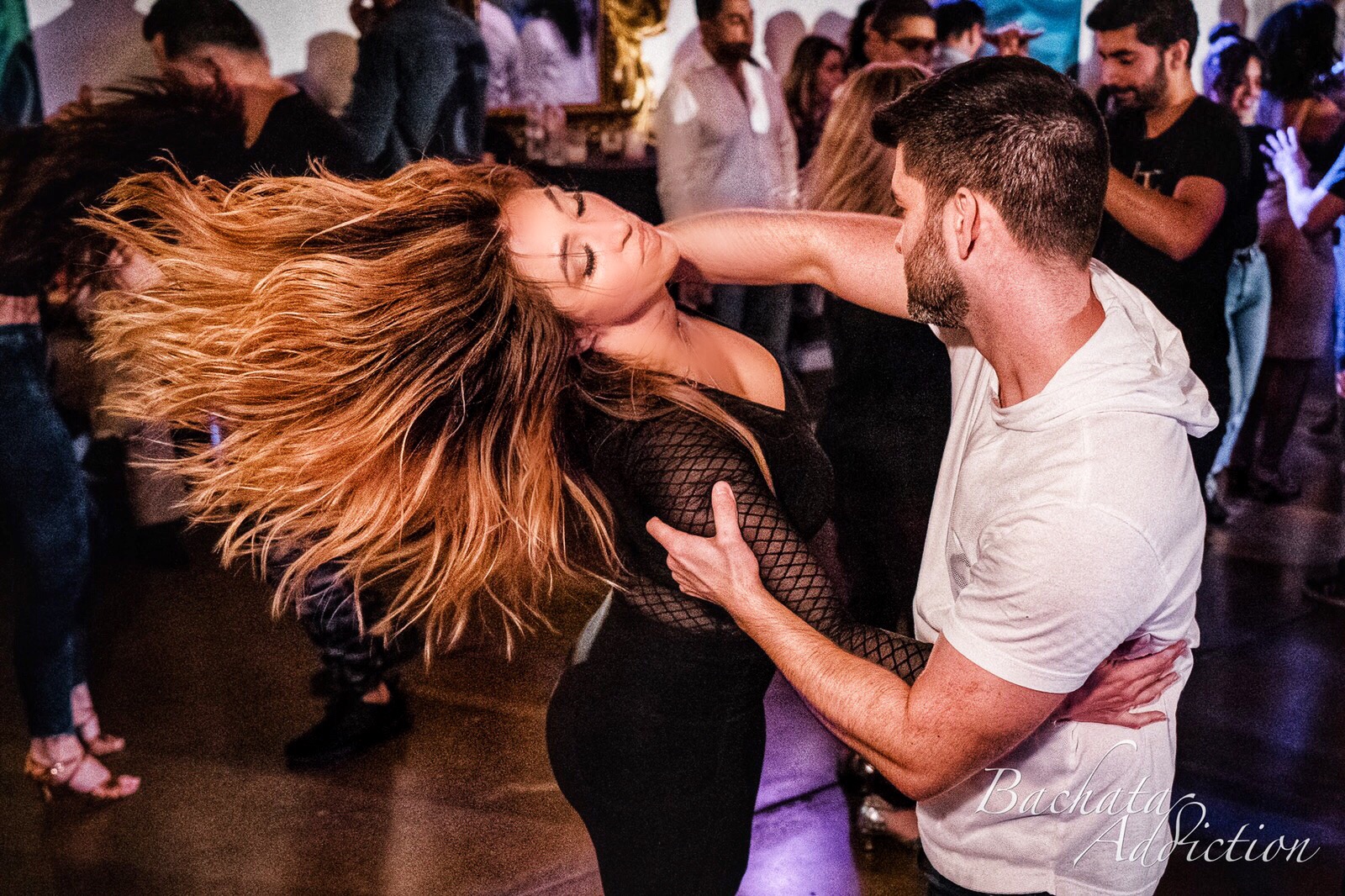 Brandon and Skye dancing together, Skye’s hair flowing