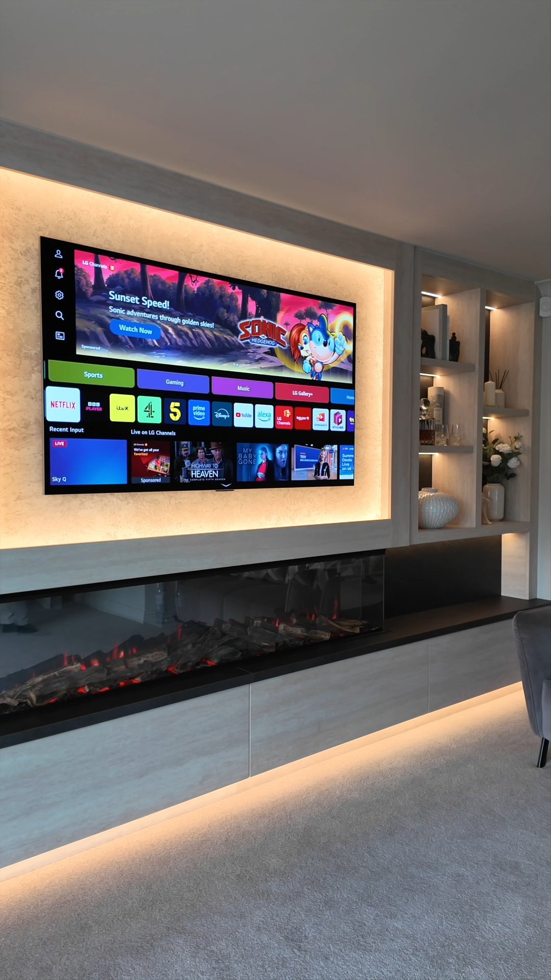 Finished LIVN media wall with fireplace and lighting on