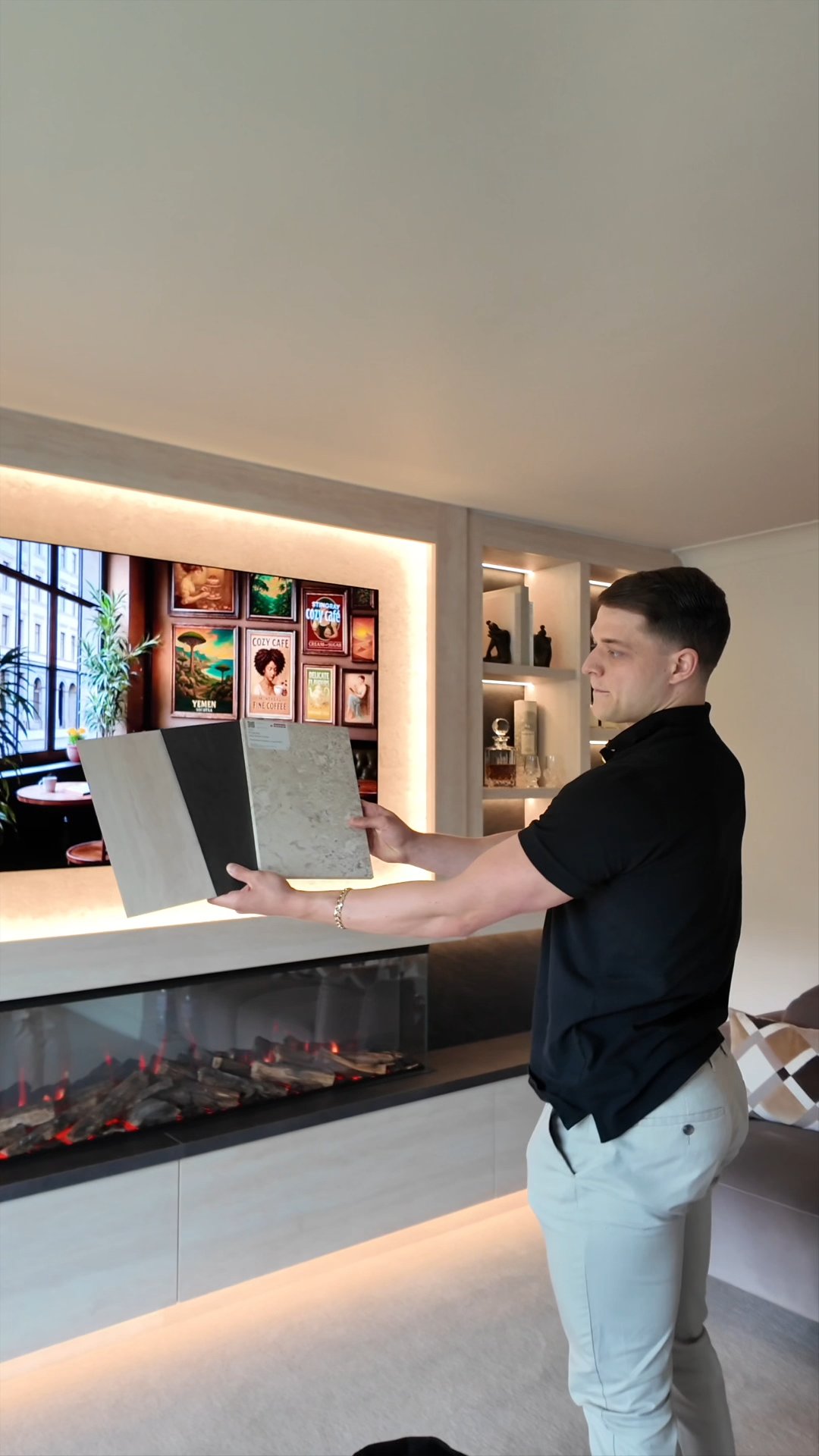Dillan showing finish sample boards at a design visit