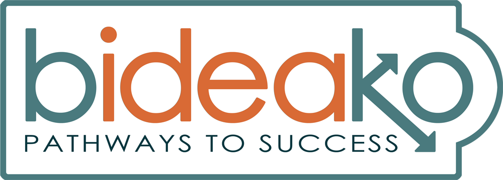 A woman smiling while participating in The Roots to Rise Business Growth Academy.