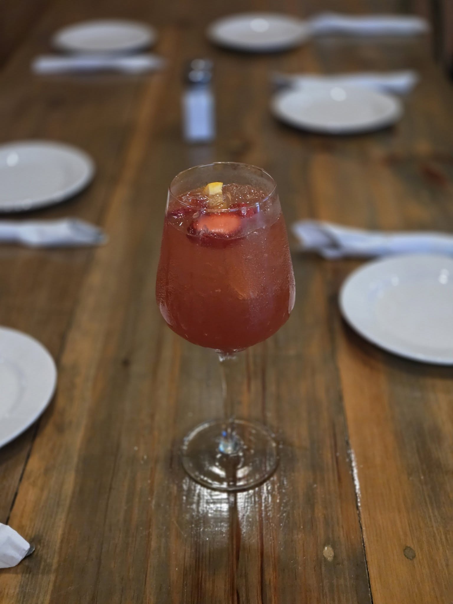 Strawberry bellini on a farm table