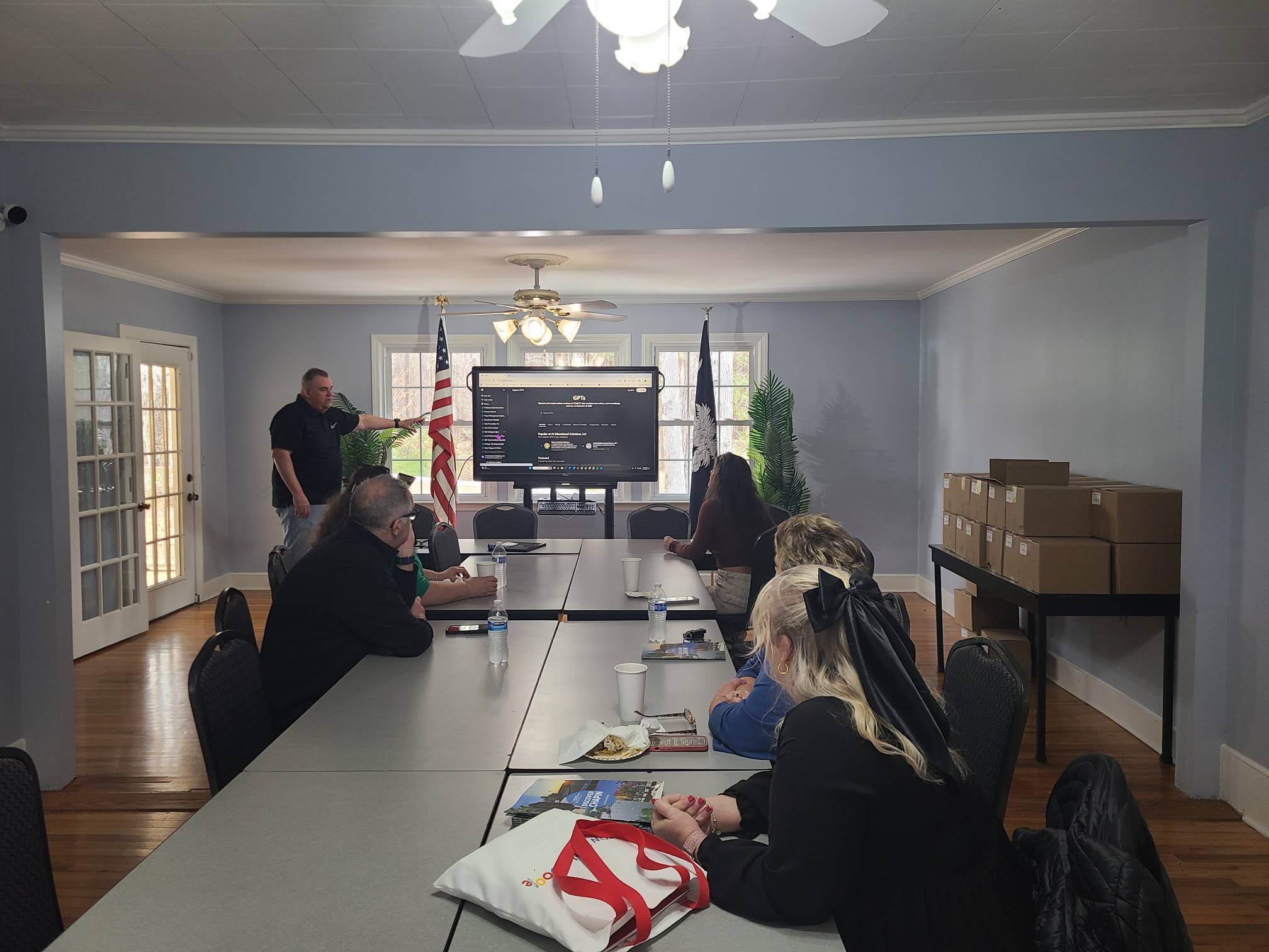 Michael with AI Educational Solutions showing a Demo at Ribbon Cutting Ceremony