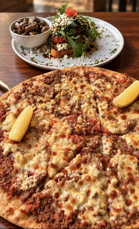 Meat and cheese manoush fresh from the wood-fired oven