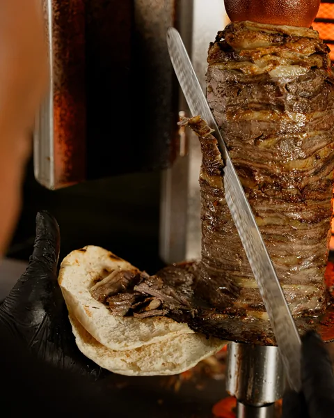 Shawarma carved from the spit
