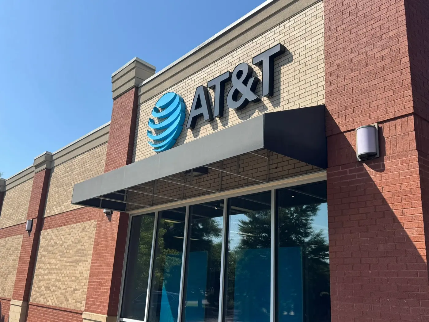 Clean storefront exterior after commercial pressure washing