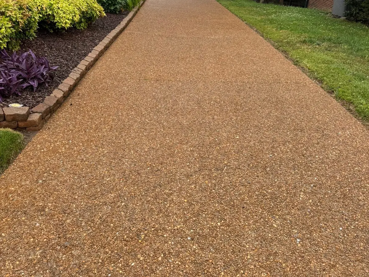 After: aggregate driveway after Wash Wizard driveway cleaning in Hendersonville, TN