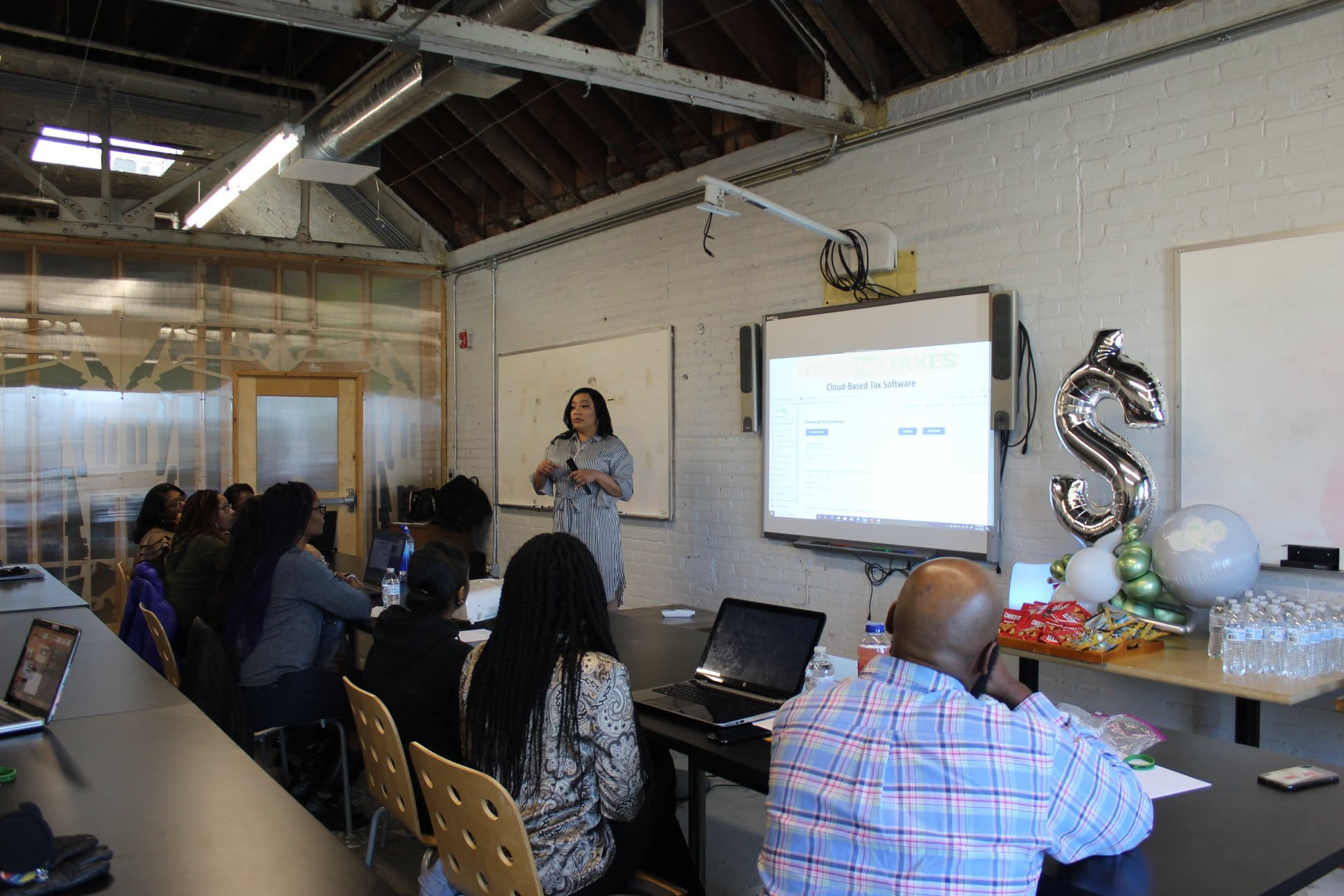 Shamis training a classroom of tax pros