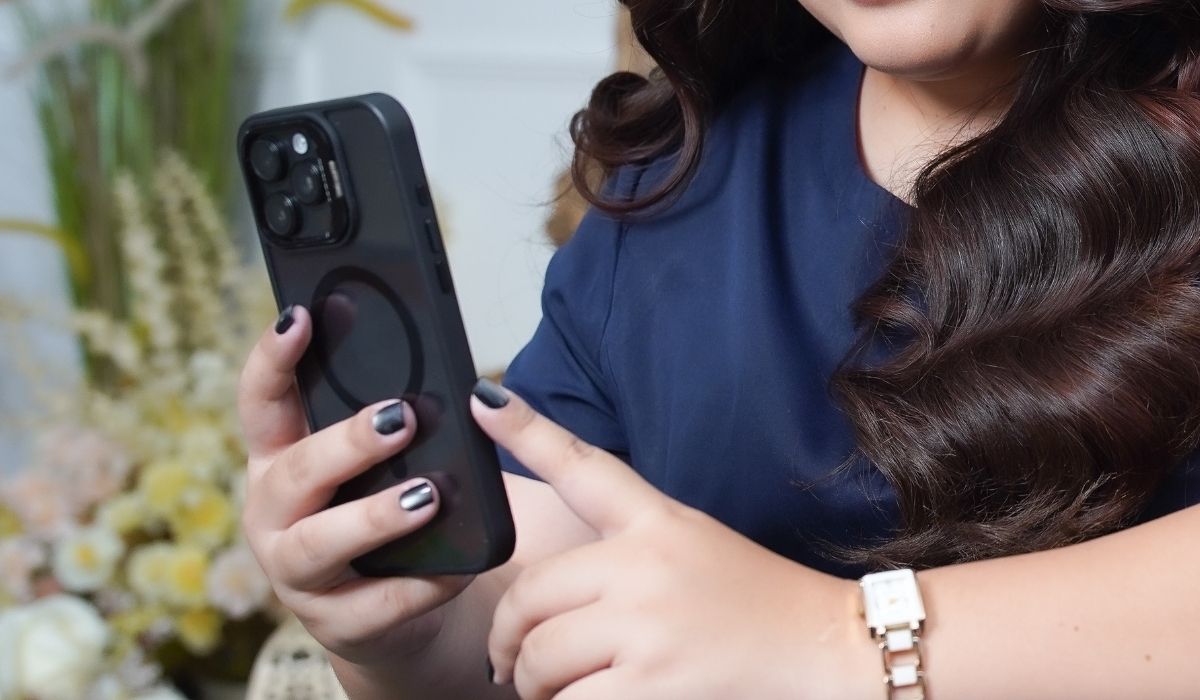 Business owner using a smartphone