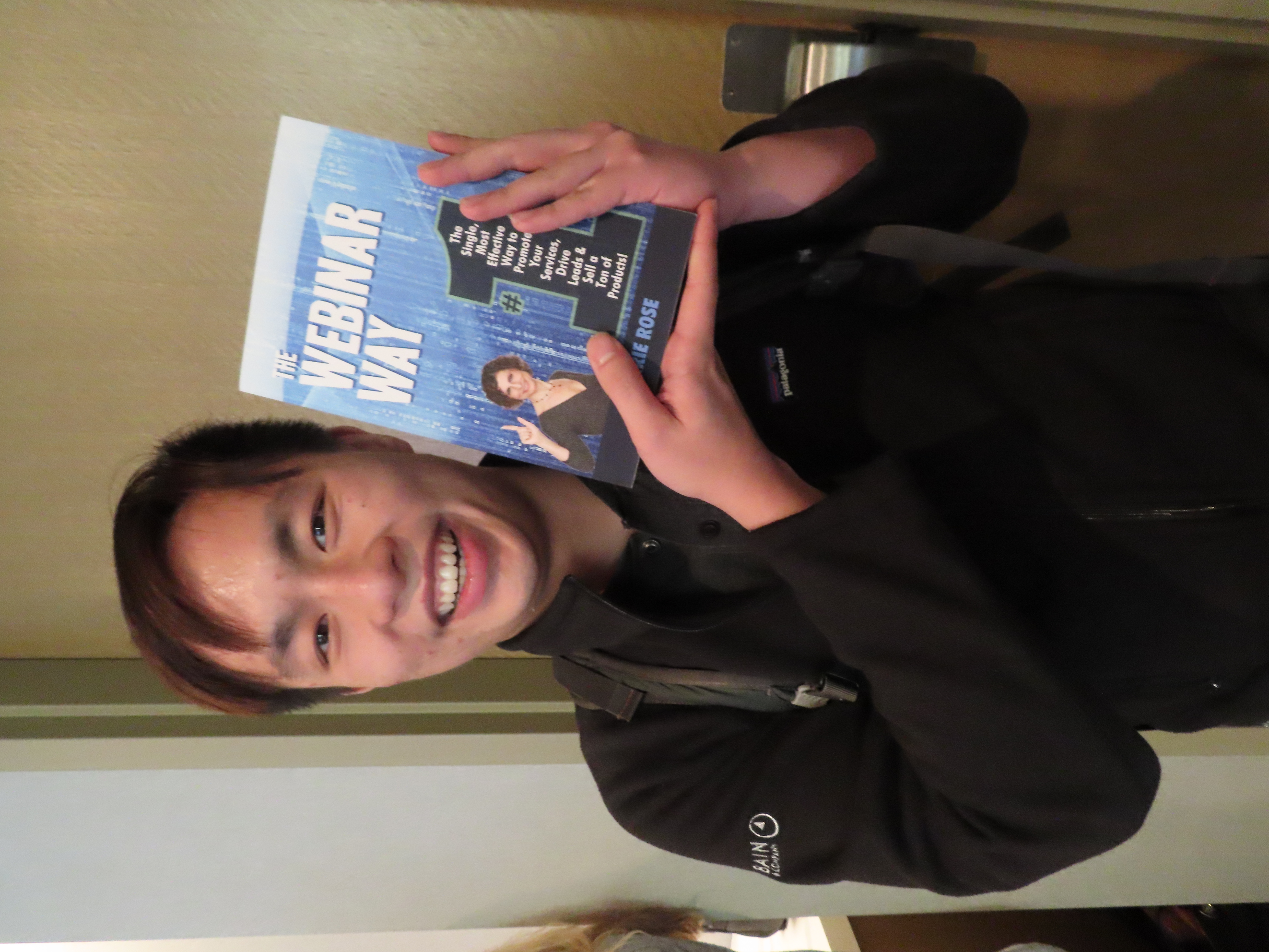 Davis Nguyen holding The Webinar Way