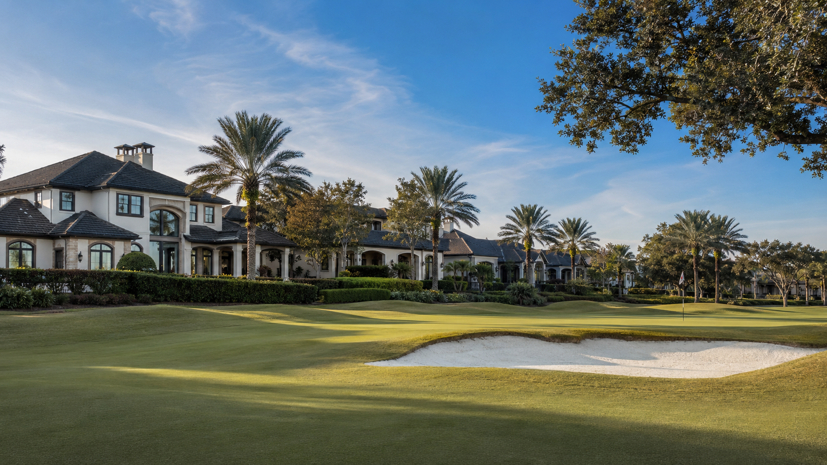 **Alt text:** Luxury homes overlooking the golf course at Lake Nona Golf and Country Club in Orlando, featuring palm trees, manicured fairways, a putting green, and a sand bunker.