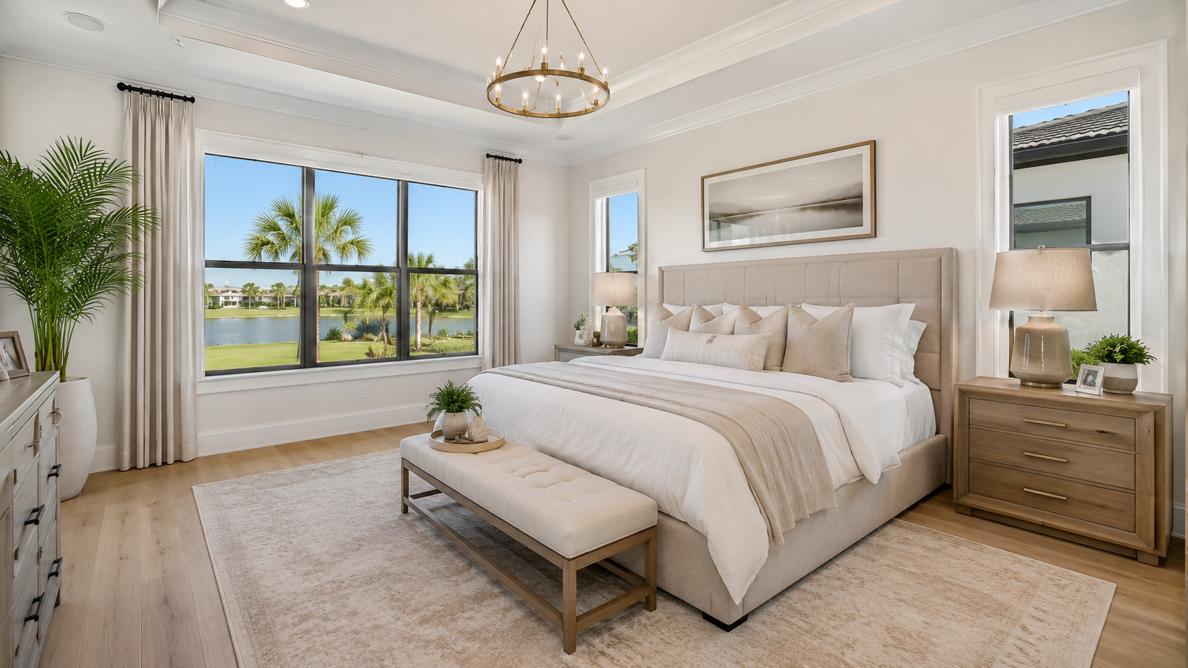 Professionally staged primary bedroom in a Lake Nona home featuring neutral bedding, modern furnishings, natural light, and peaceful Florida lake views designed to attract buyers.