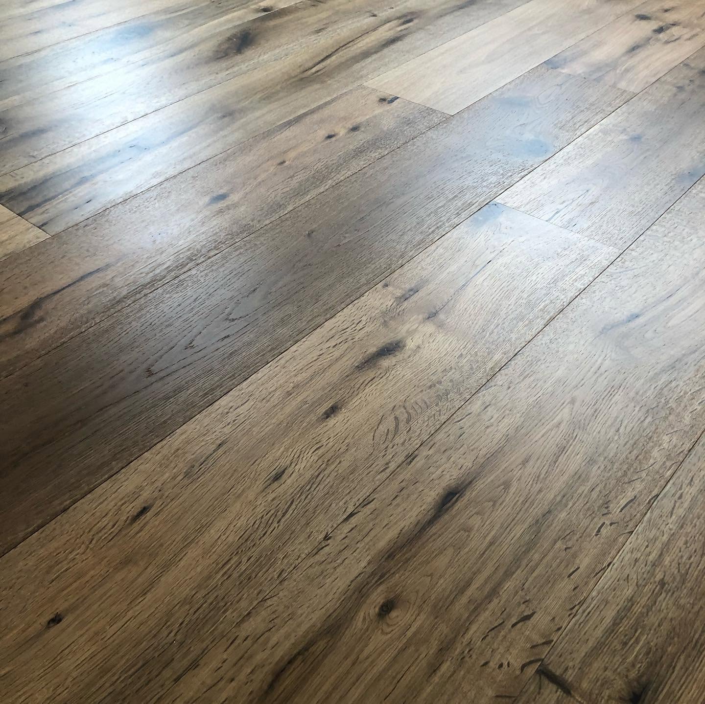 Close-up of new waterproof vinyl plank floor with tight seams
