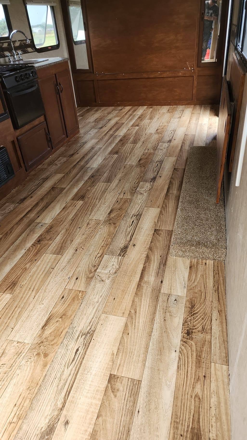 Wood-look plank flooring installed in a mobile home in Statesboro, GA