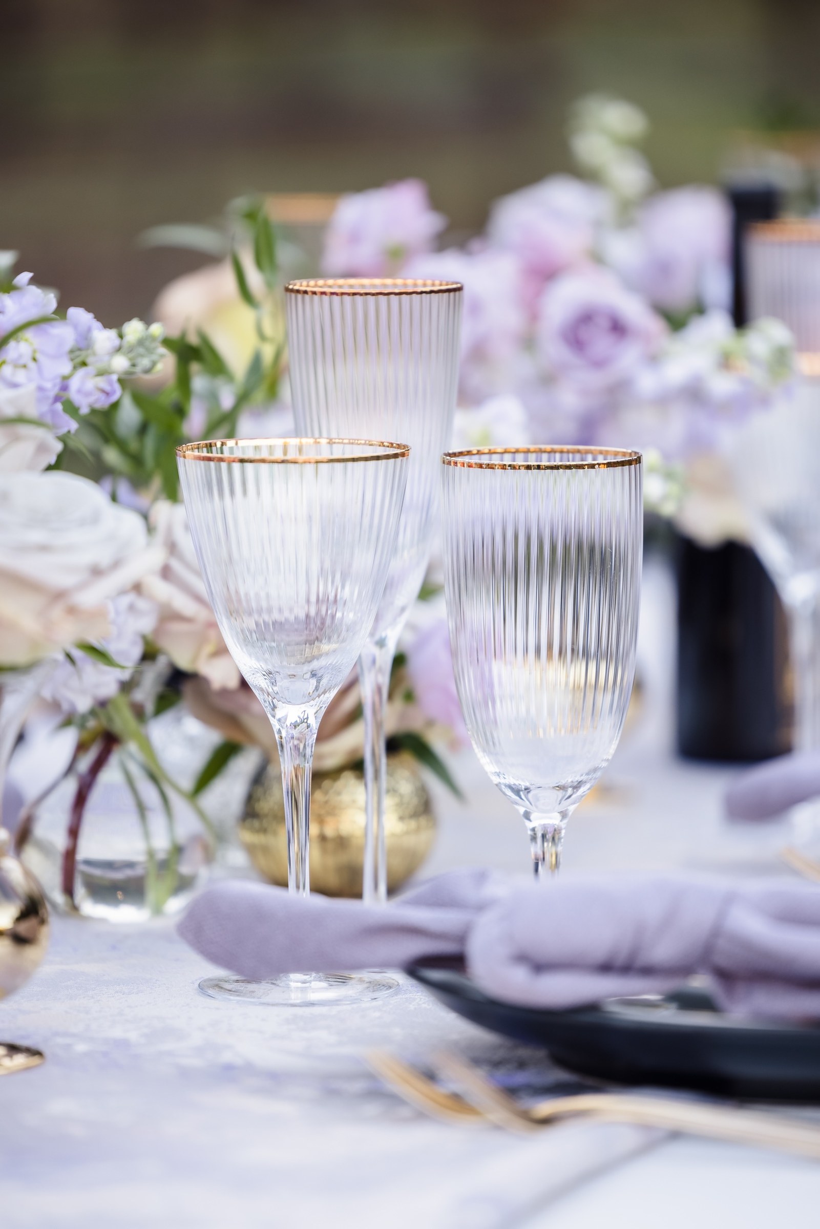Gold-rimmed glassware detail at the Napa executive dinner