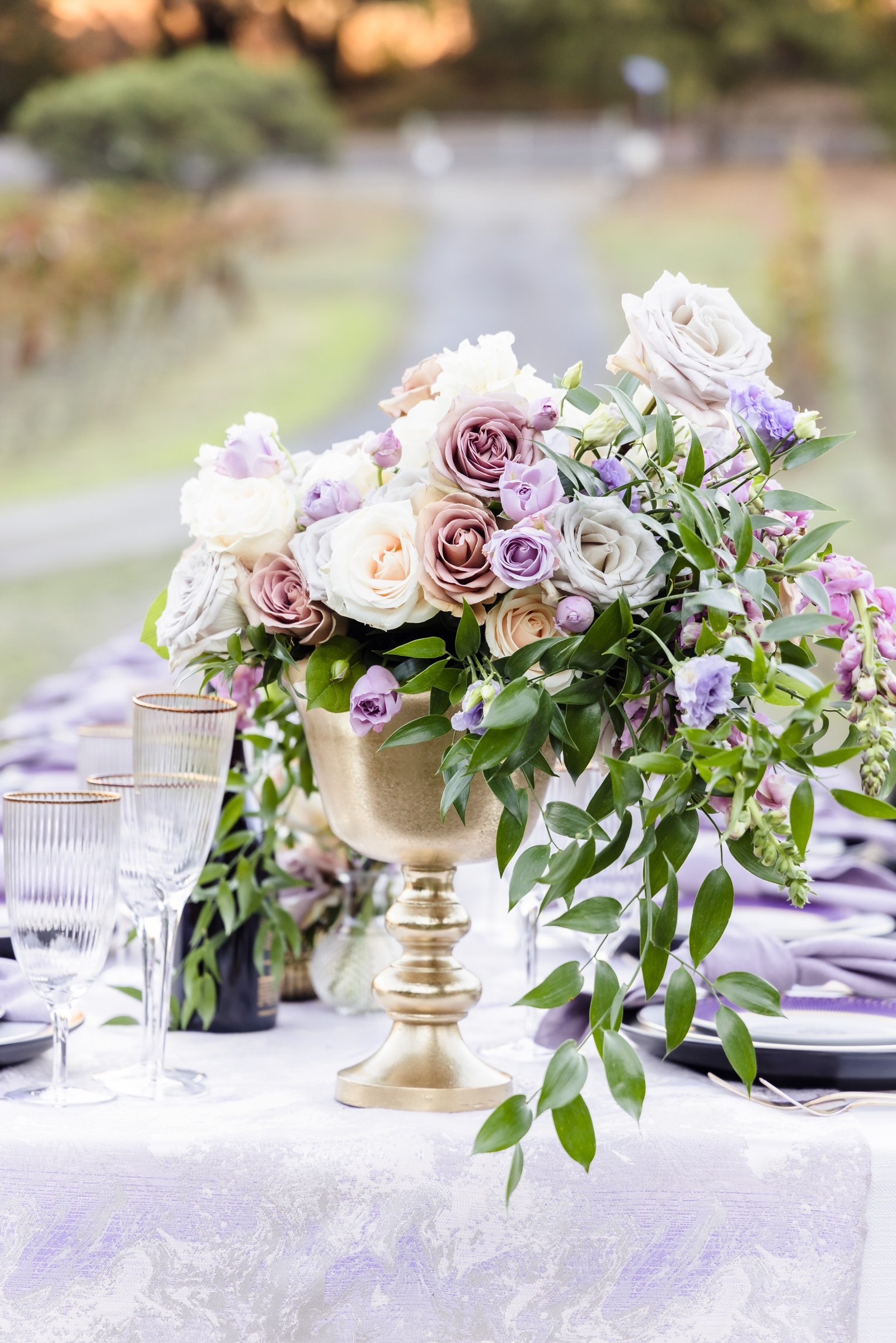 Gold-footed floral centerpiece at the Napa executive dinner