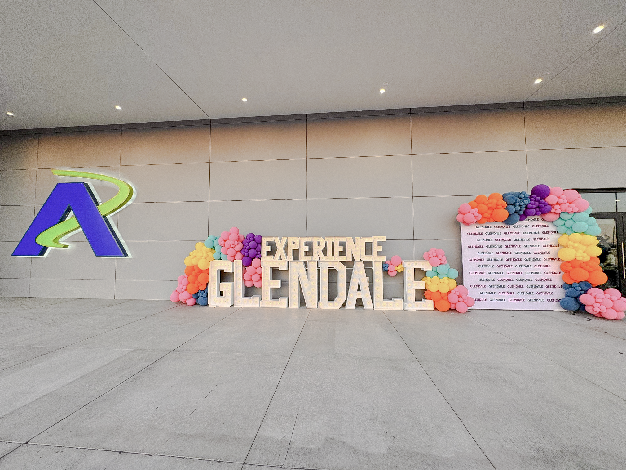 Experience Glendale illuminated letters and colorful balloon installation