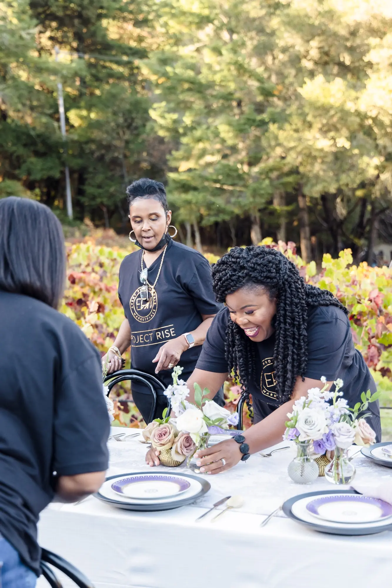 MES production team completing floral installation at the retreat dinner