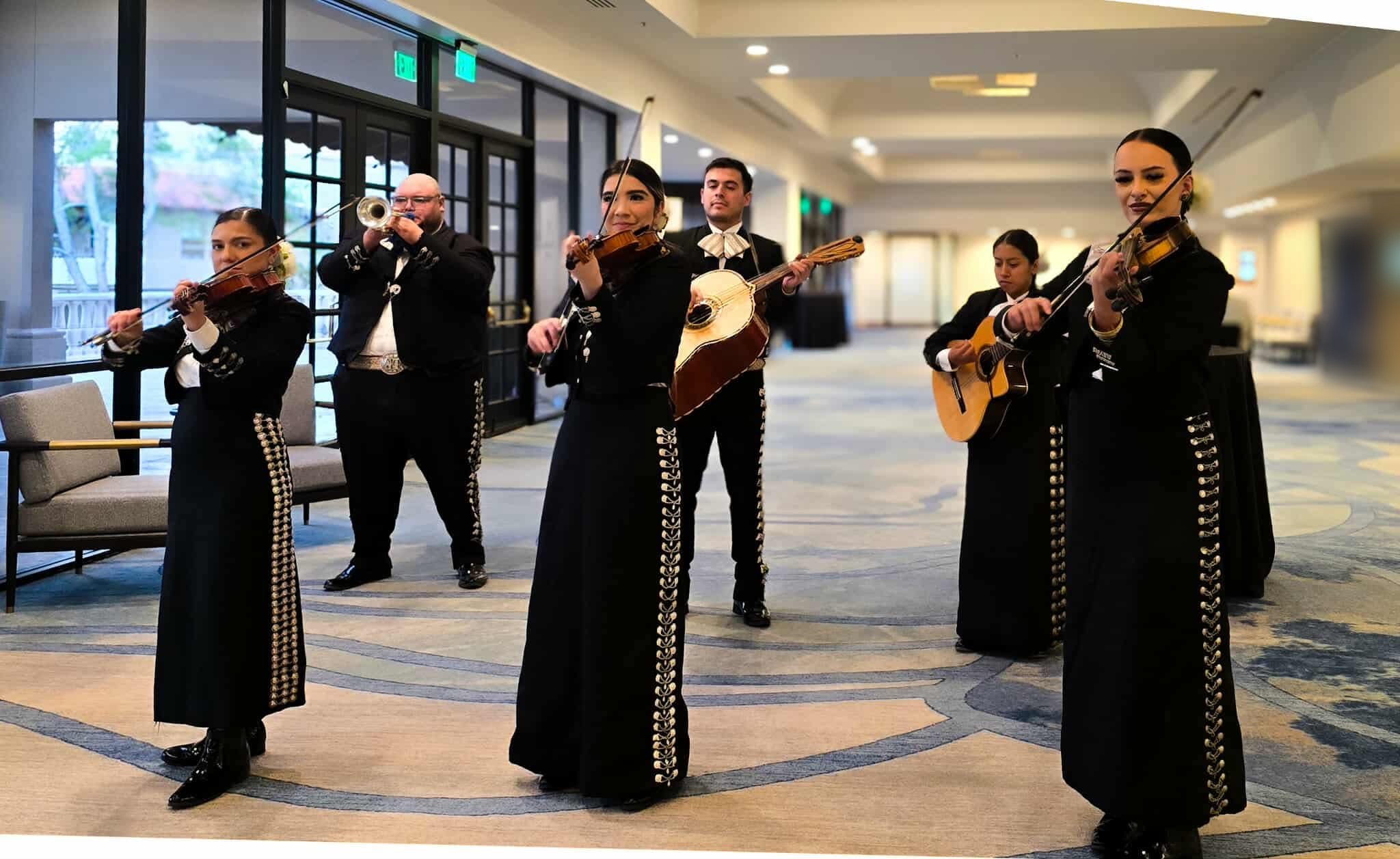 Mariachi band performing at a confidential leadership conference