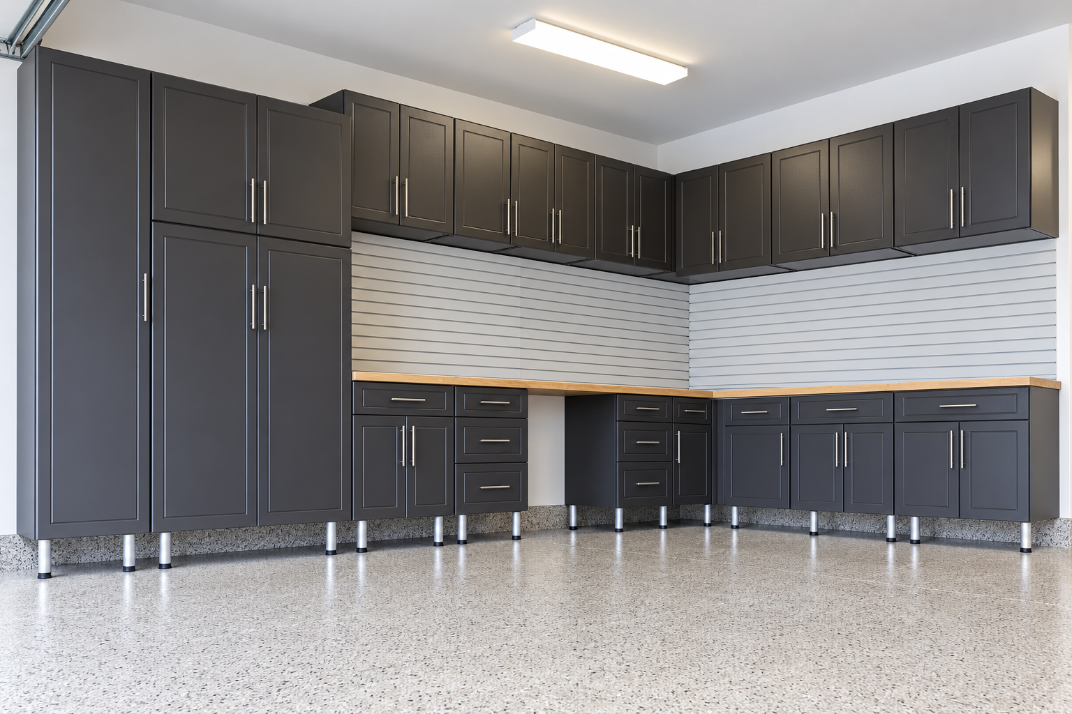 Custom garage cabinets, slatwall, and epoxy floor coating installed by Boise Garage Titan