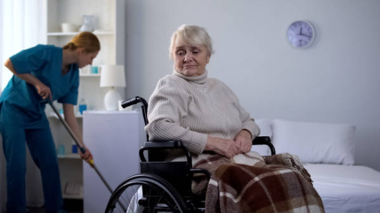 caregiver doing light house keeping