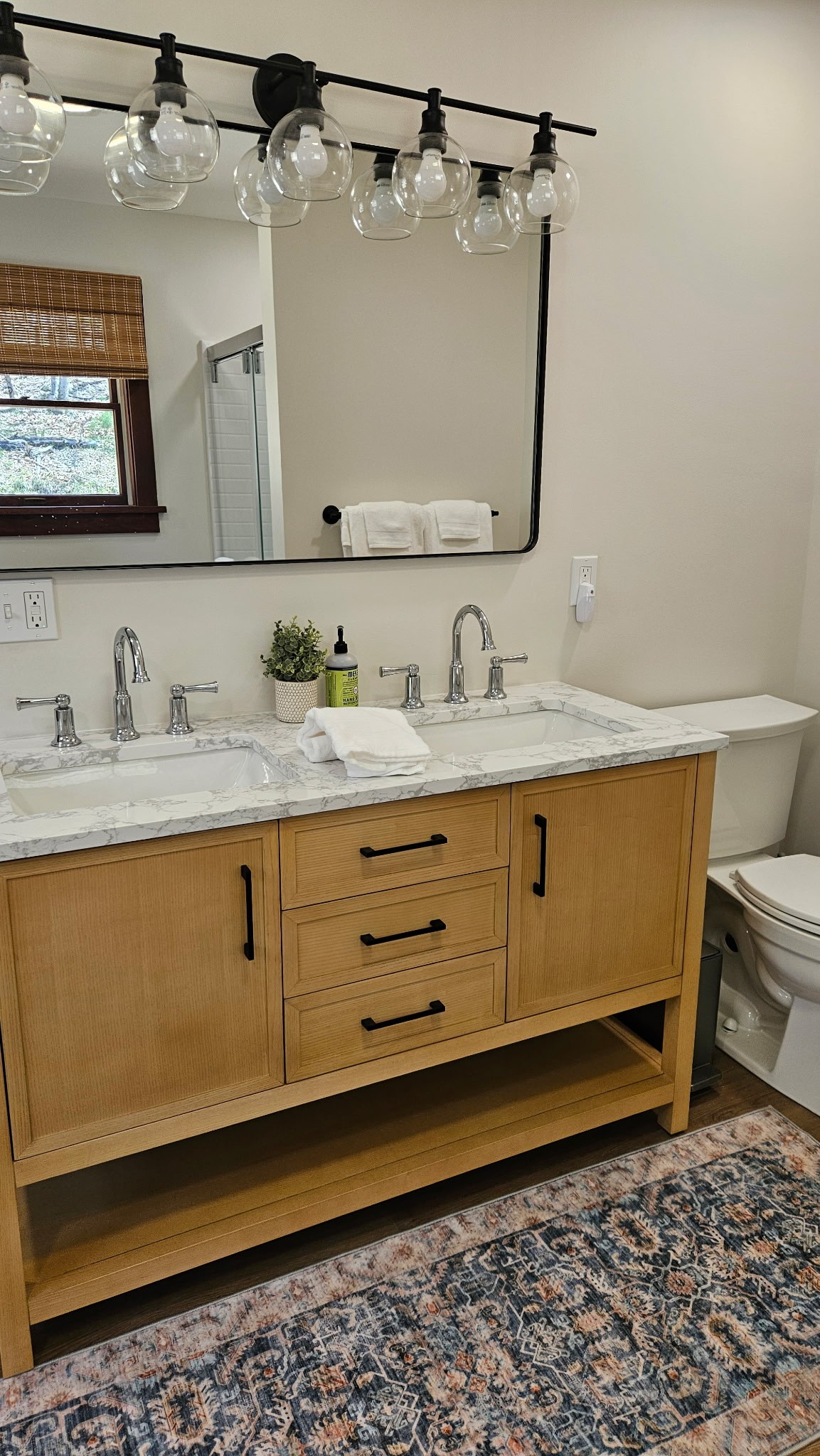 Get ready side by side in the Master Bath — double sinks, marble counter, no negotiating who goes first.