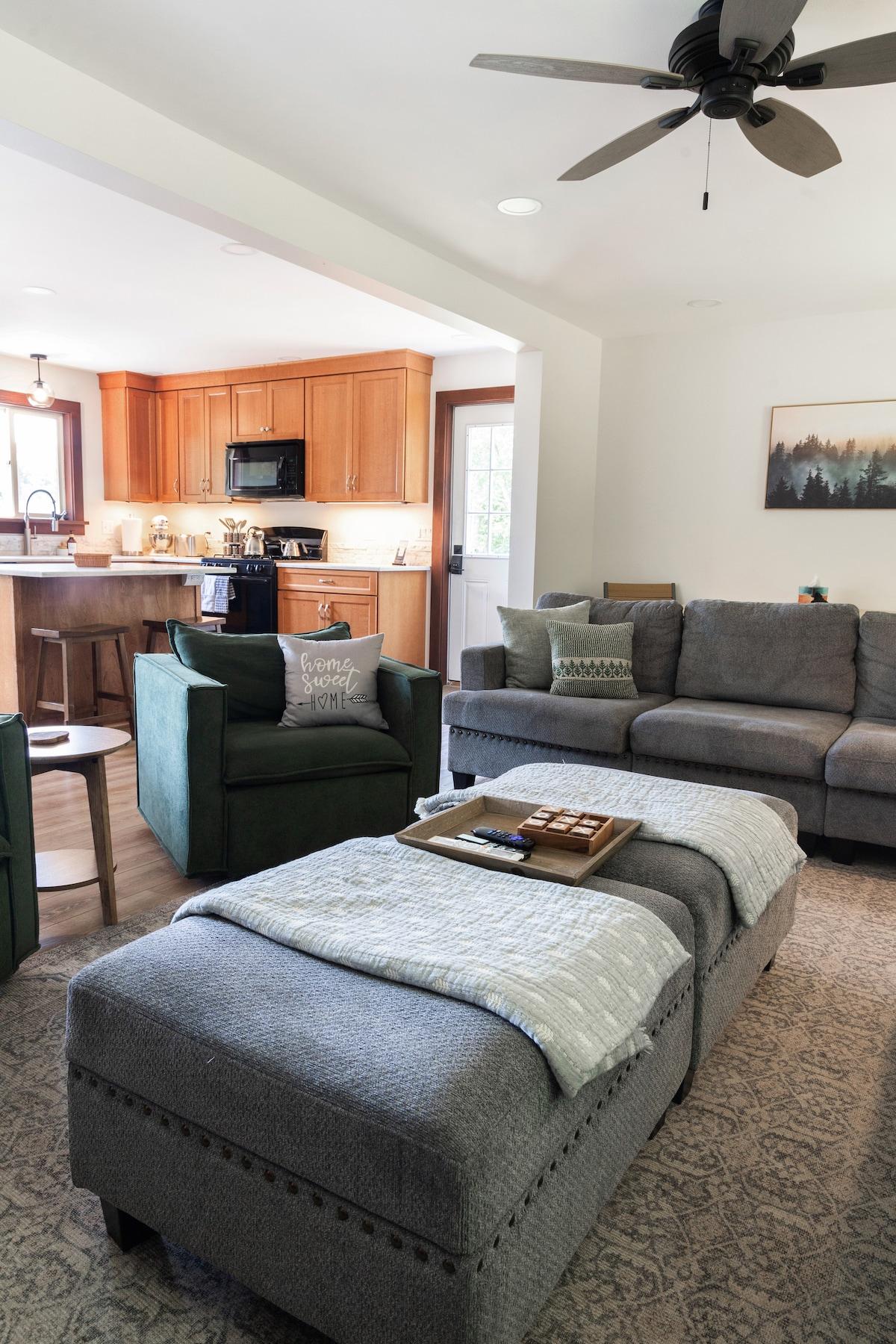 Claim one of the green chairs, pour something warm, and call it your reading spot for the week.