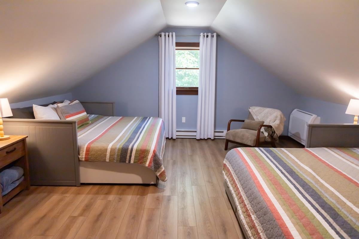 Bedroom 3 — upstairs Keene Room with two king beds at The Overlook ADK